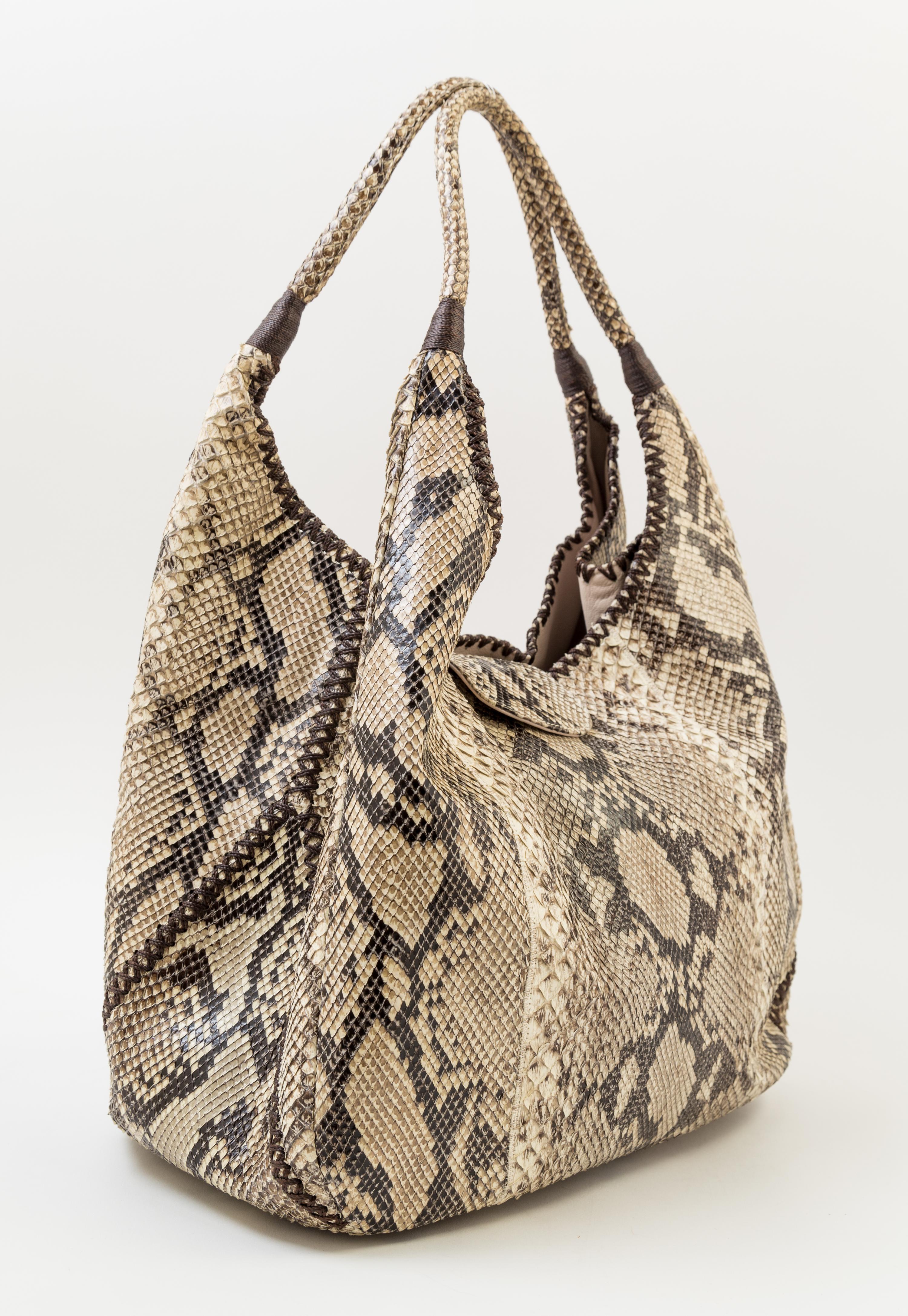 A Carlos Falchi Snakeskin Shoulder Bag, 13" x 11.5" x 7"; Strap drop: 11".