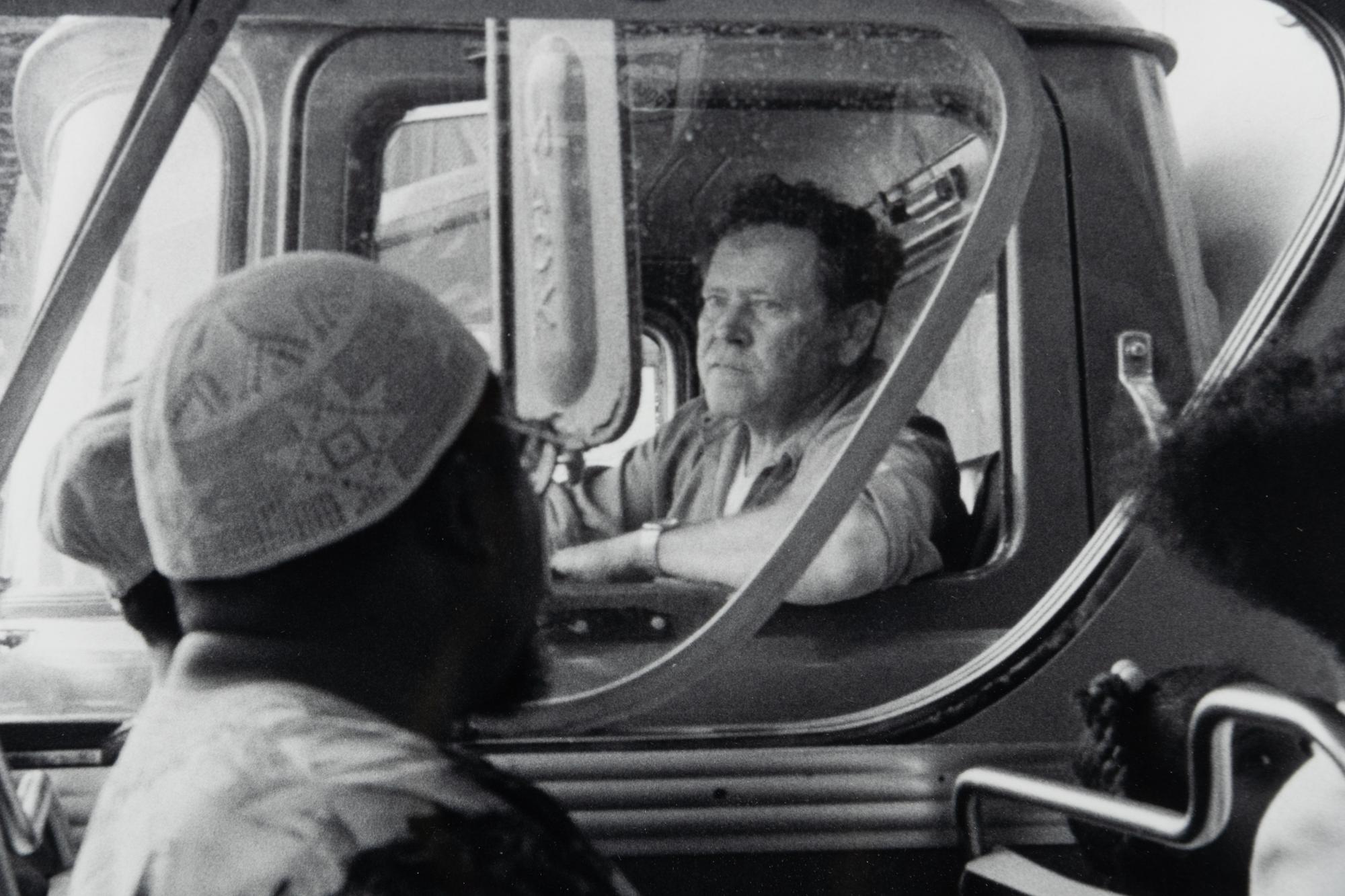 Bus Passing a Truck Driver from Visions of Hopes and Desires