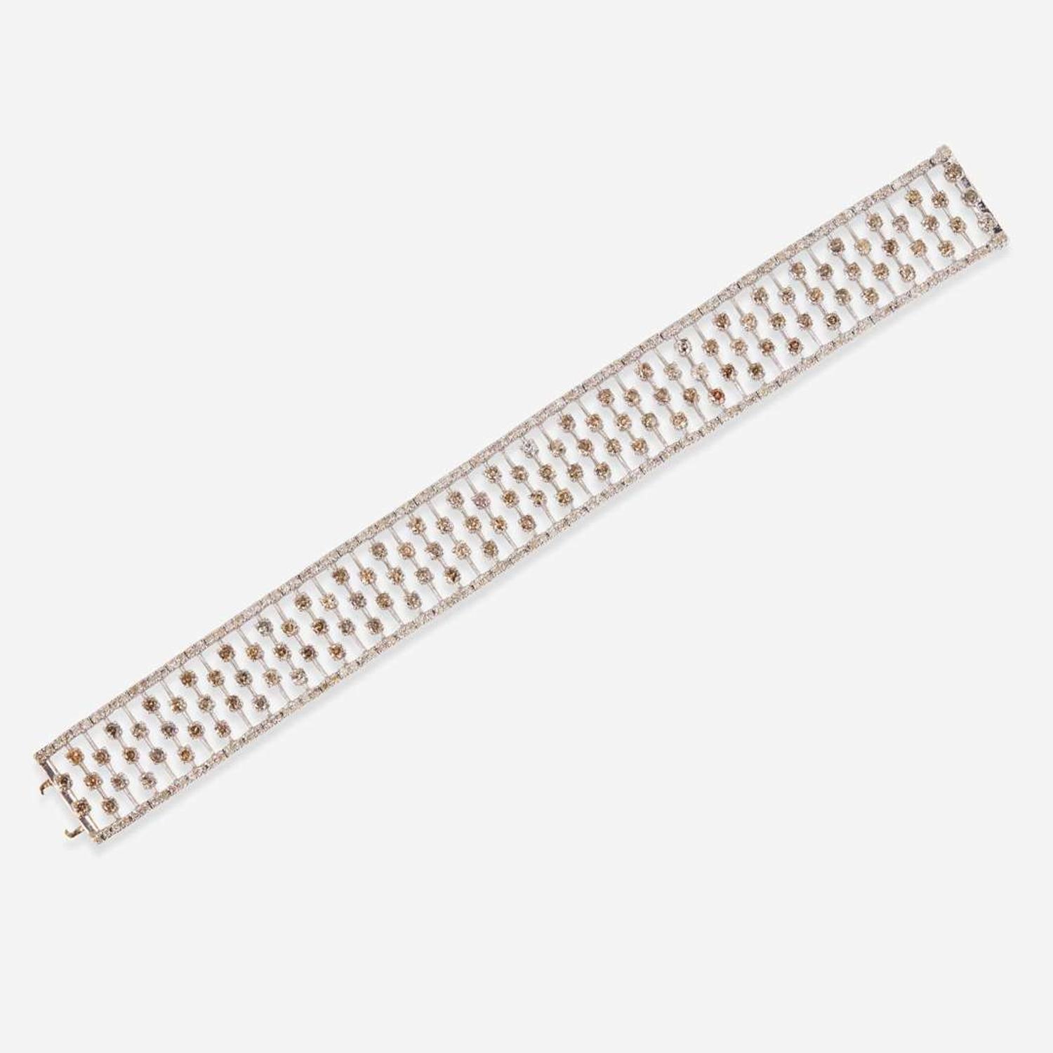 An 18K White Gold, Diamond, and Colored Diamond Bracelet