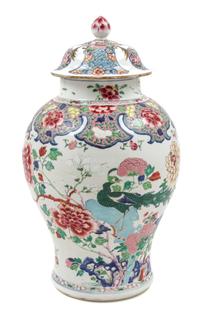 A Chinese Export Famille Rose Porcelain Covered Jar Height 17 1/2 inches.