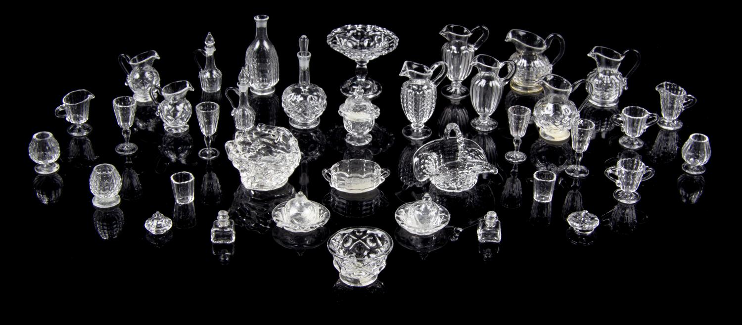 A Collection of Glass Table Articles Height of tallest decanter 1 1/8 inches.