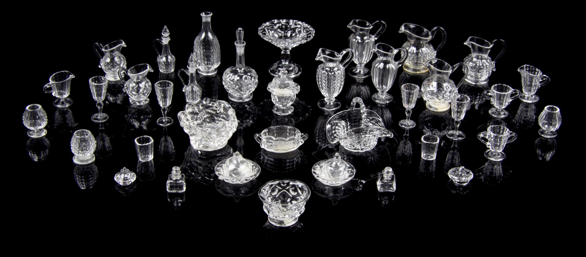 A Collection of Glass Table Articles Height of tallest decanter 1 1/8 inches.