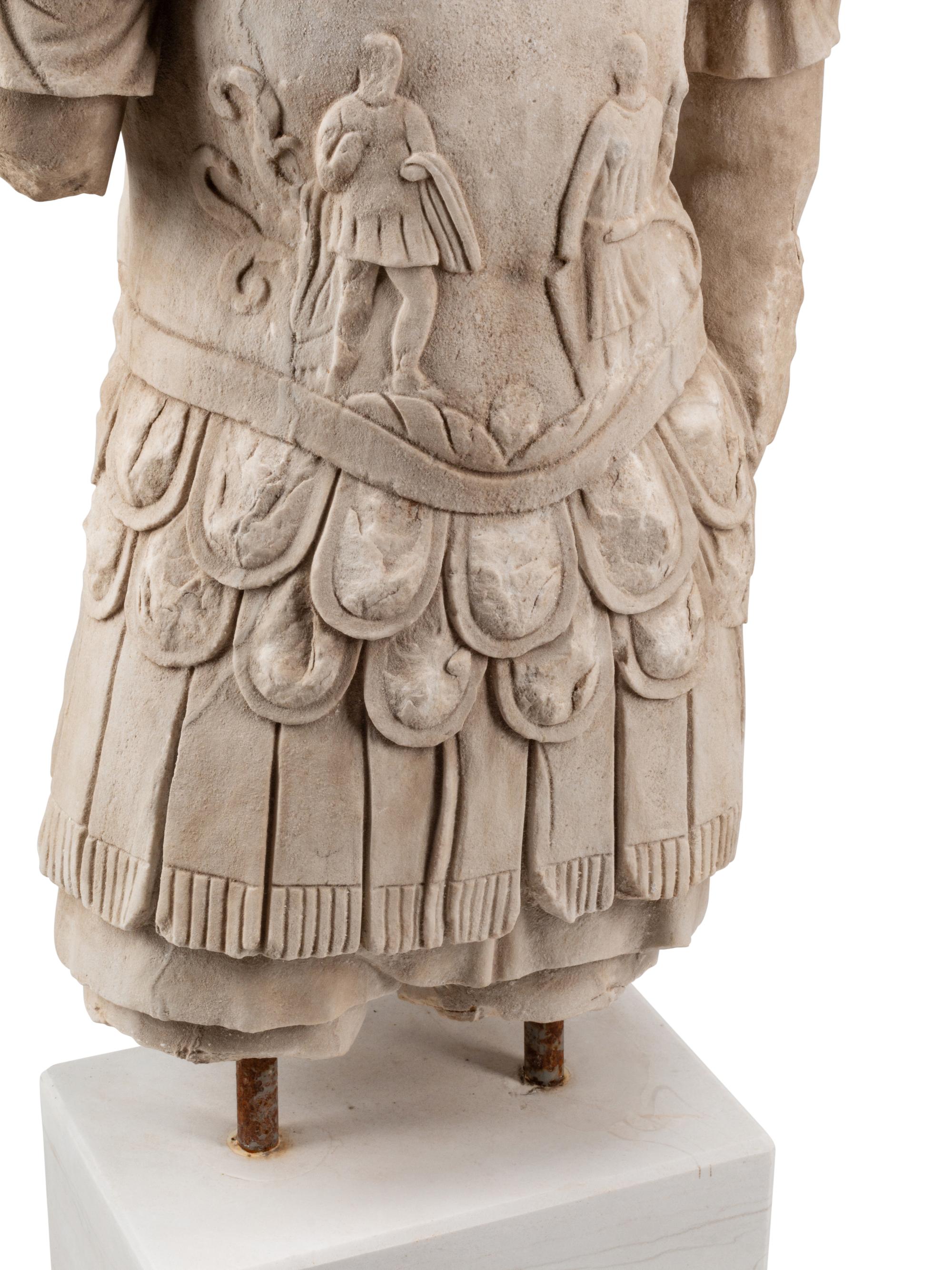 A Continental Marble Torso of a Roman Soldier