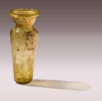 A Roman Yellow-Green Glass Amphoriskos