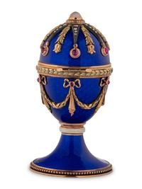 A 14 Karat Vari-Color Gold, Guilloché Enamel, Diamond, and Cabochon Jewel-Mounted Egg-Form Perfume and a Related Guilloché Enamel, 14 Karat Vari-Color Gold, Diamond, and Cabochon-Mounted Surprise Egg