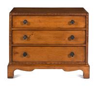 A Contemporary Carved Walnut Chest of Drawers
