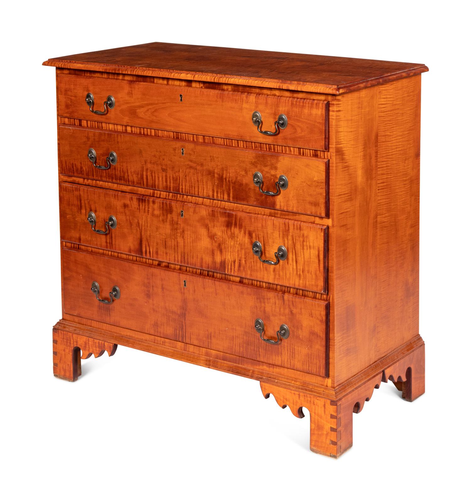 A Chippendale Style Tiger Maple Chest of Drawers