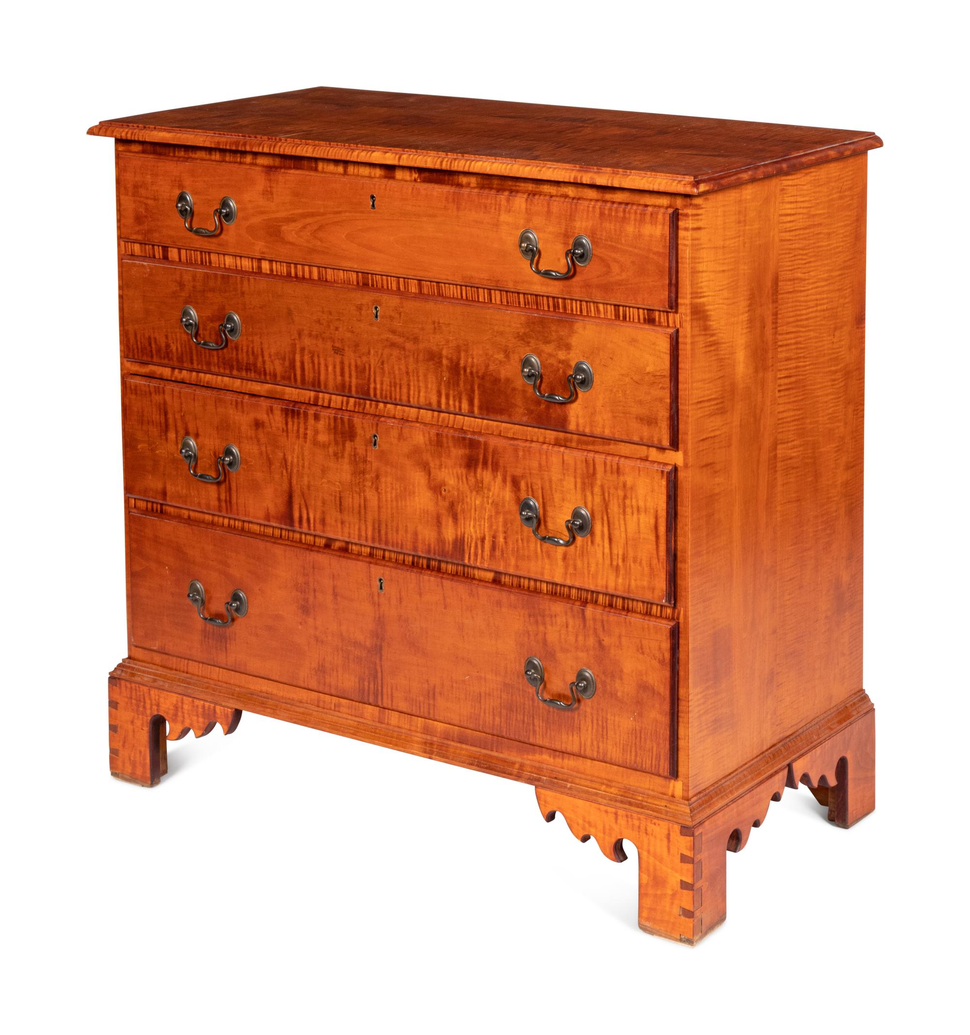 A Chippendale Style Tiger Maple Chest of Drawers