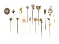 COLLECTION OF STICKPINS AND A BROOCH