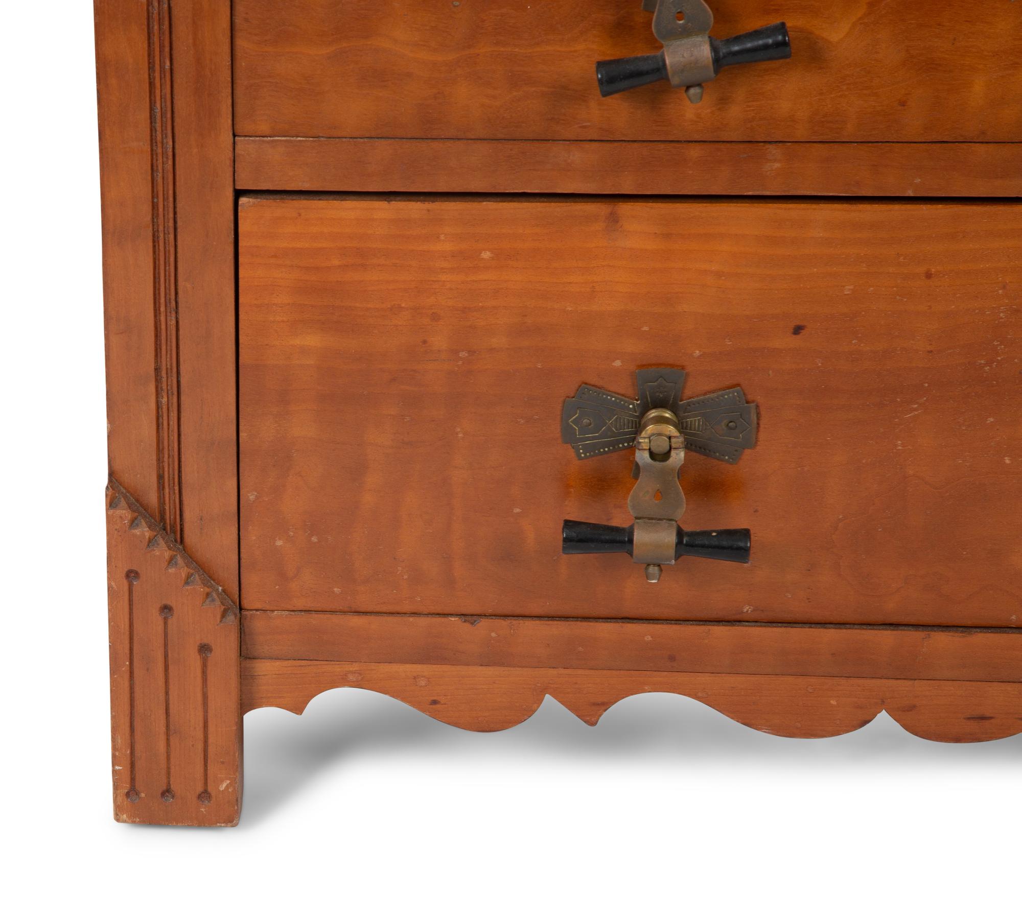 A Victorian Eastlake Aesthetic Flame Cherry Chest of Drawers — EARLY 20TH CENTURY