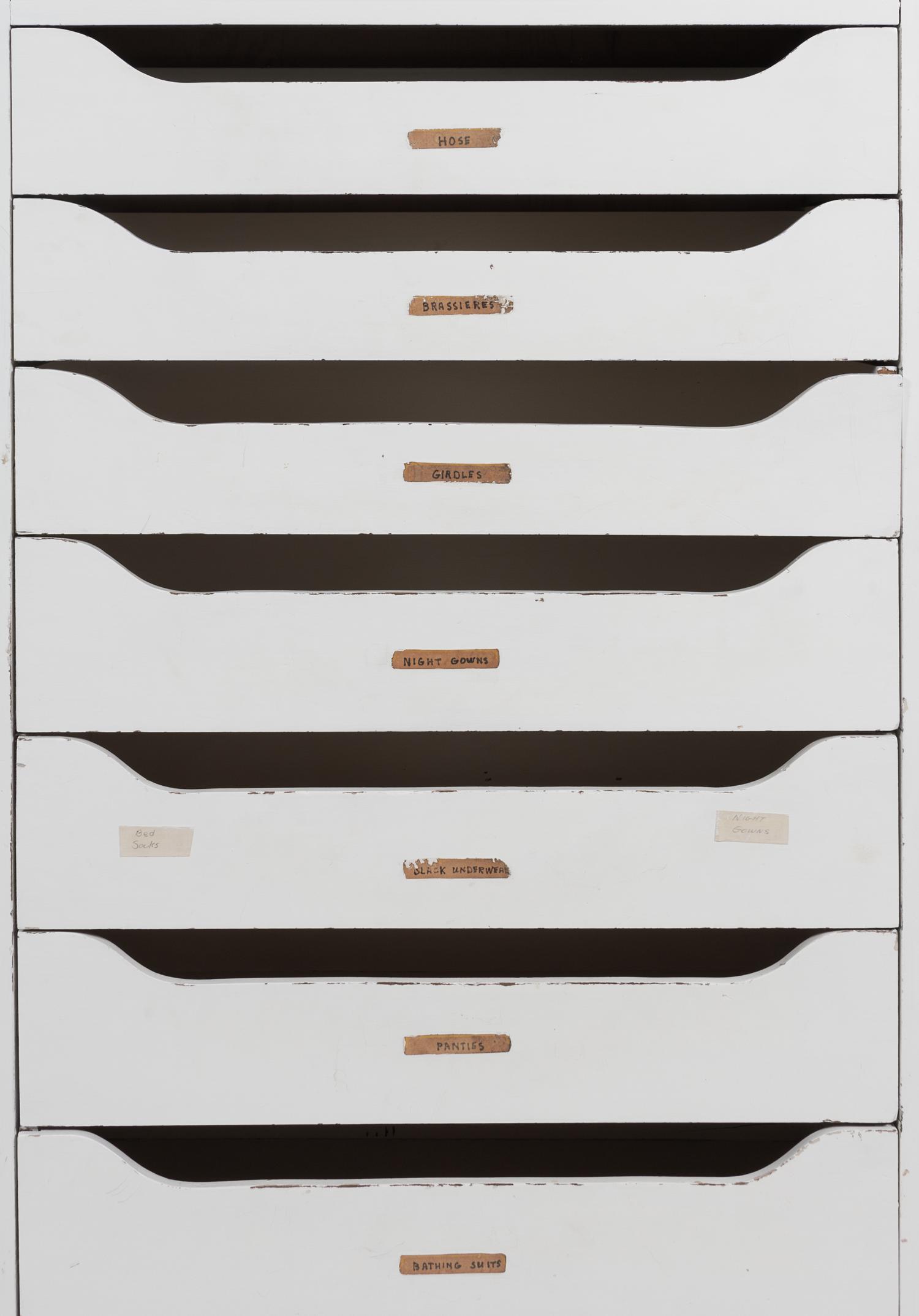 A Pair of White Painted Banks of Drawers Height 60 1/2 x width 31 x depth 12 inches.