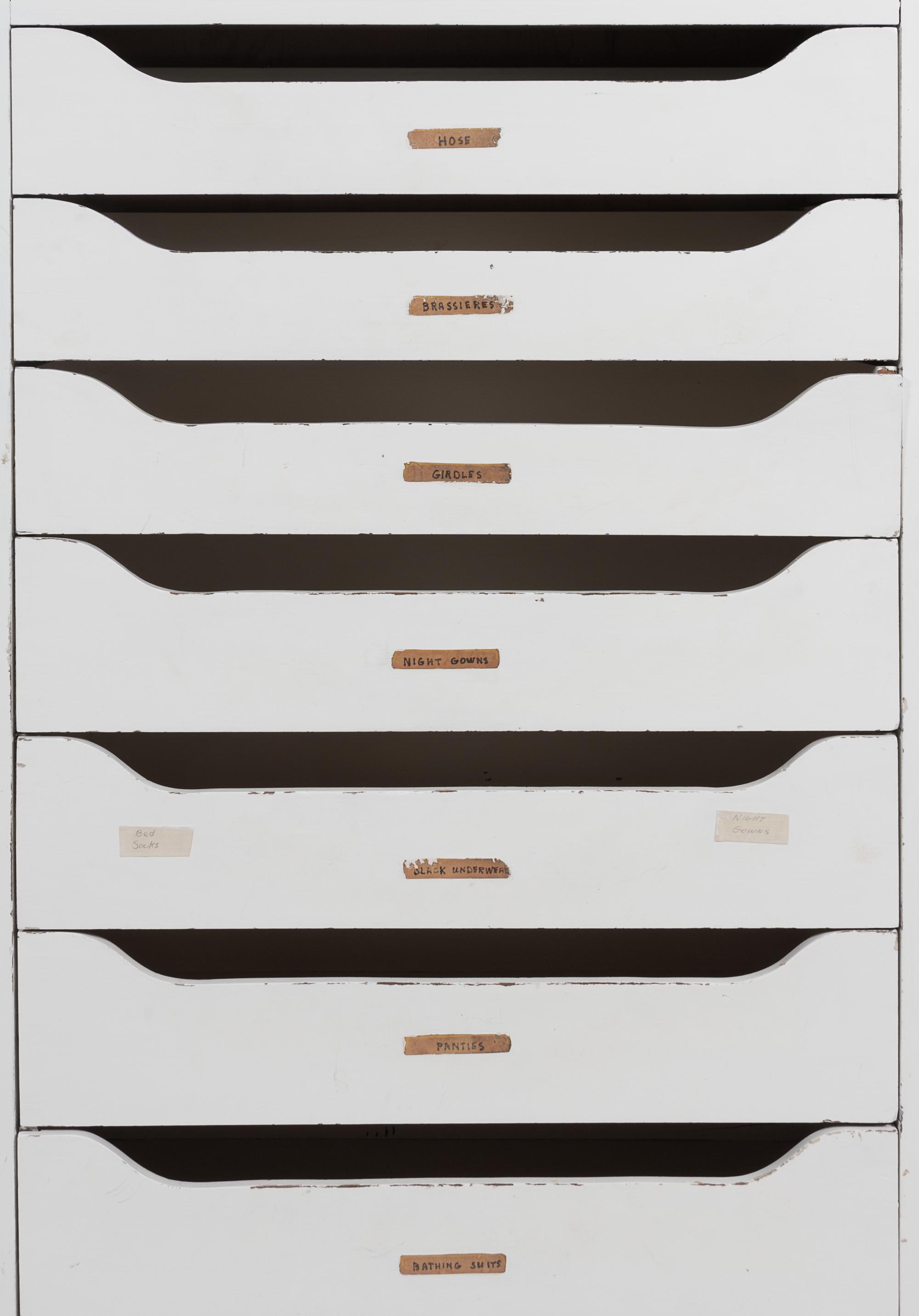 A Pair of White Painted Banks of Drawers Height 60 1/2 x width 31 x depth 12 inches.