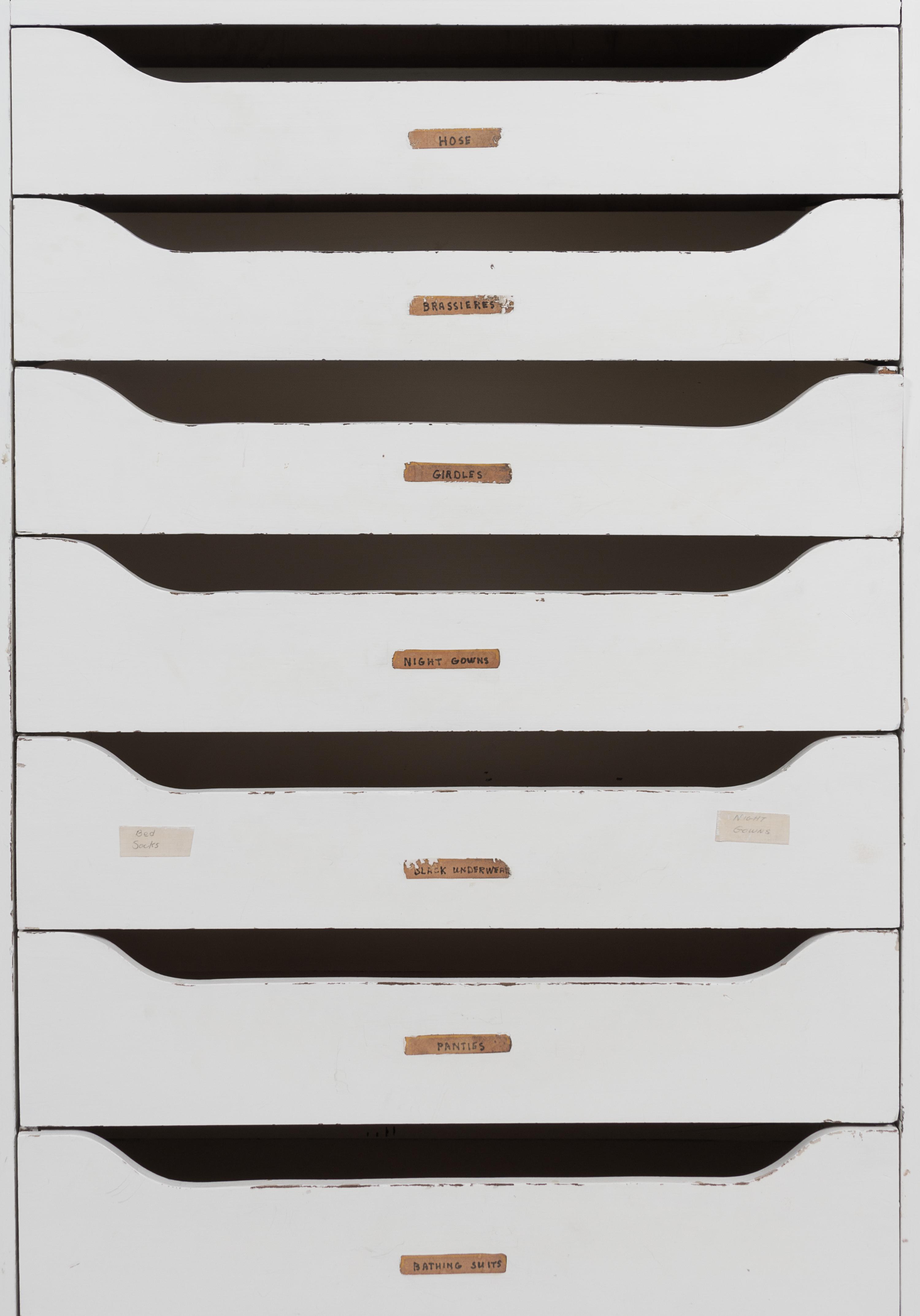 A Pair of White Painted Banks of Drawers Height 60 1/2 x width 31 x depth 12 inches.