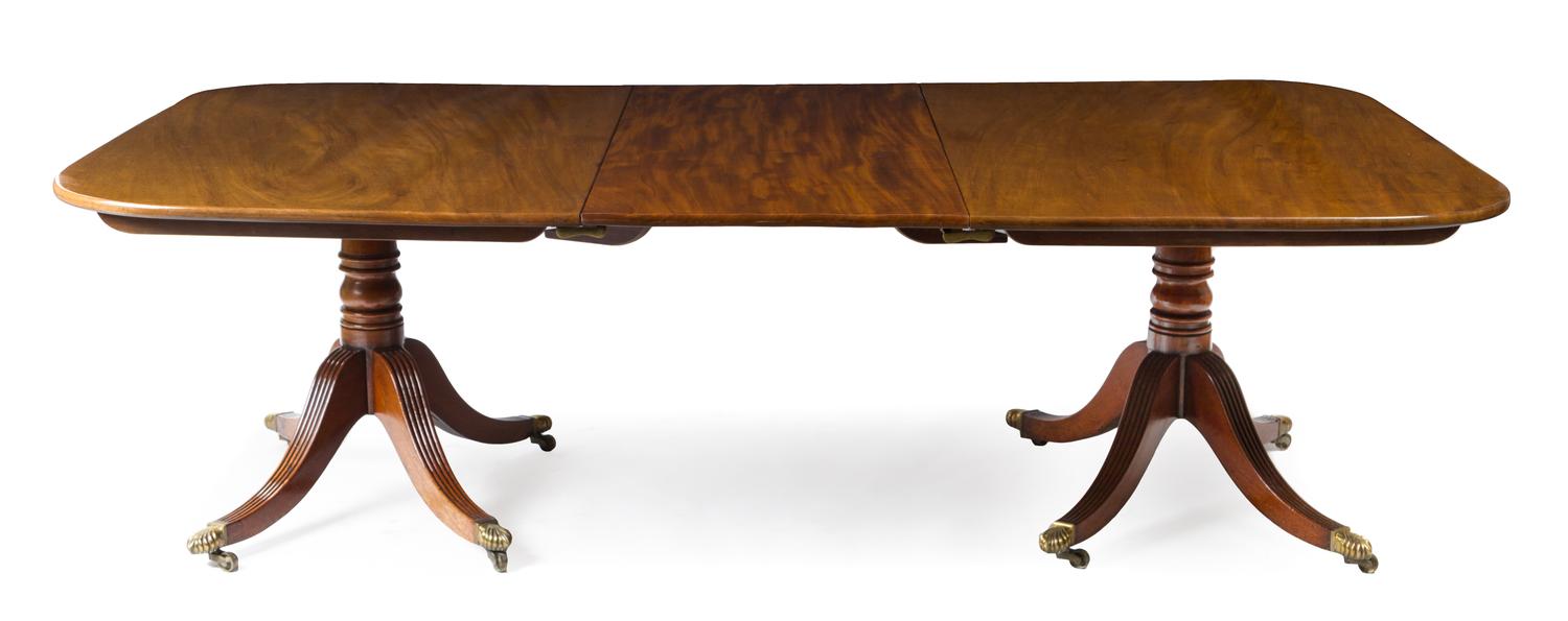 A George III Style Mahogany Double Pedestal Dining Table Height 28 x depth 55 inches.