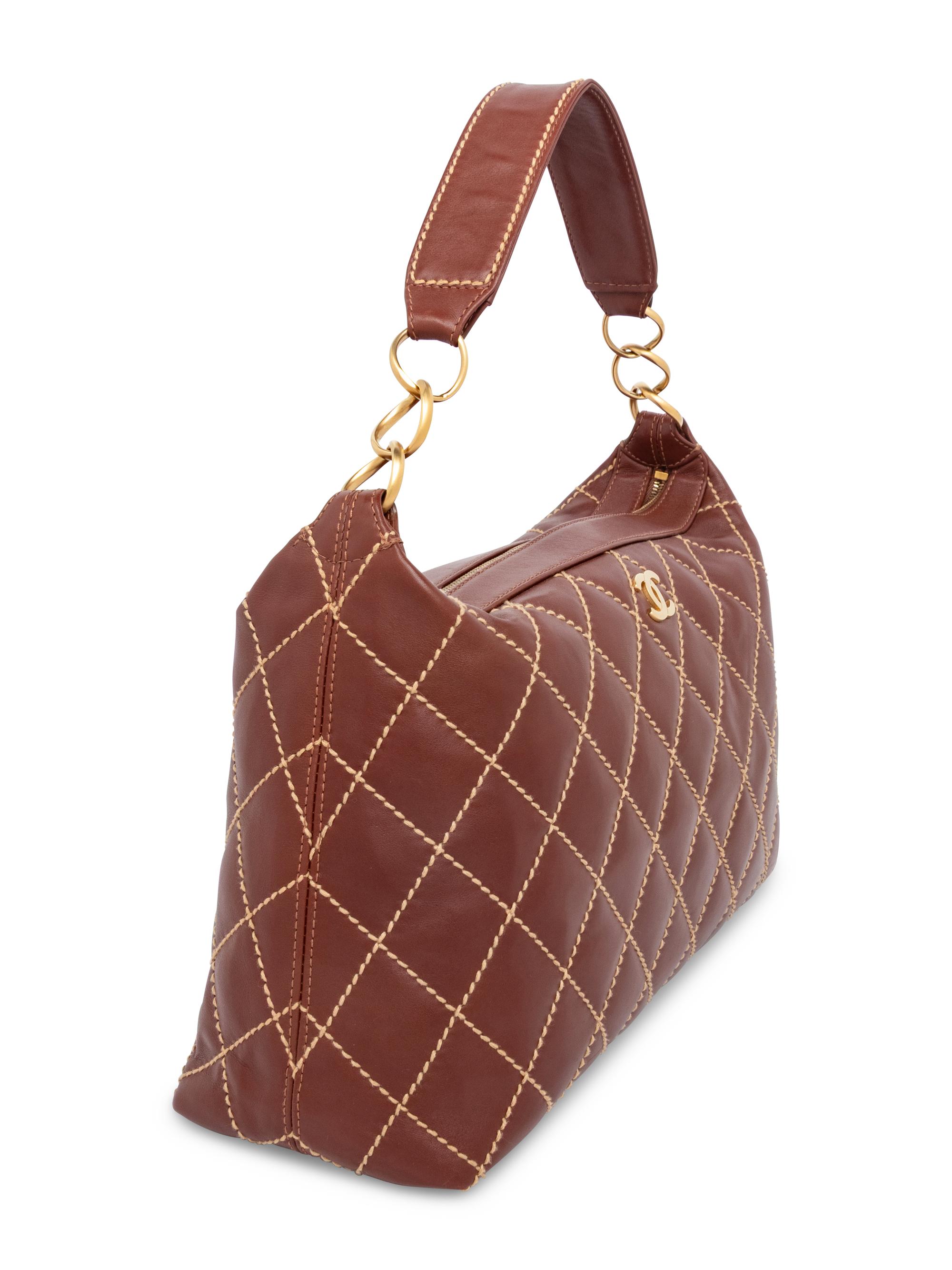 CHANEL, SURPIQUE LEATHER HOBO BAG