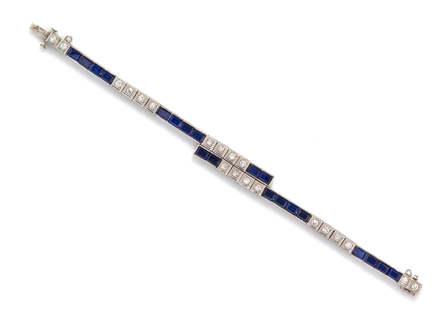 A 14 Karat White Gold Synthetic Sapphire and Diamond Bracelet, 10.30 dwts.