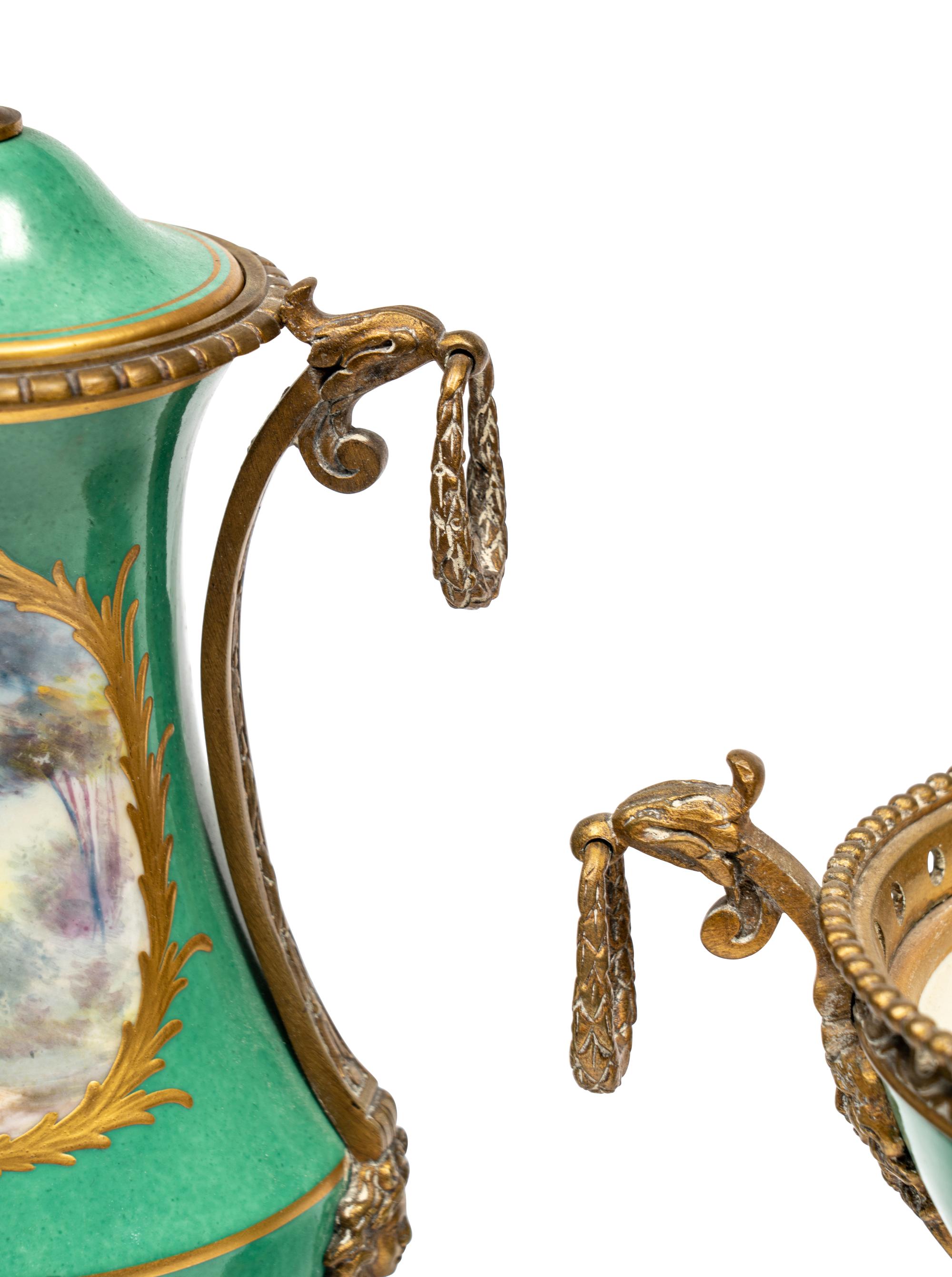 A Gilt Metal Mounted Sèvres Style Porcelain Three-Piece Garniture