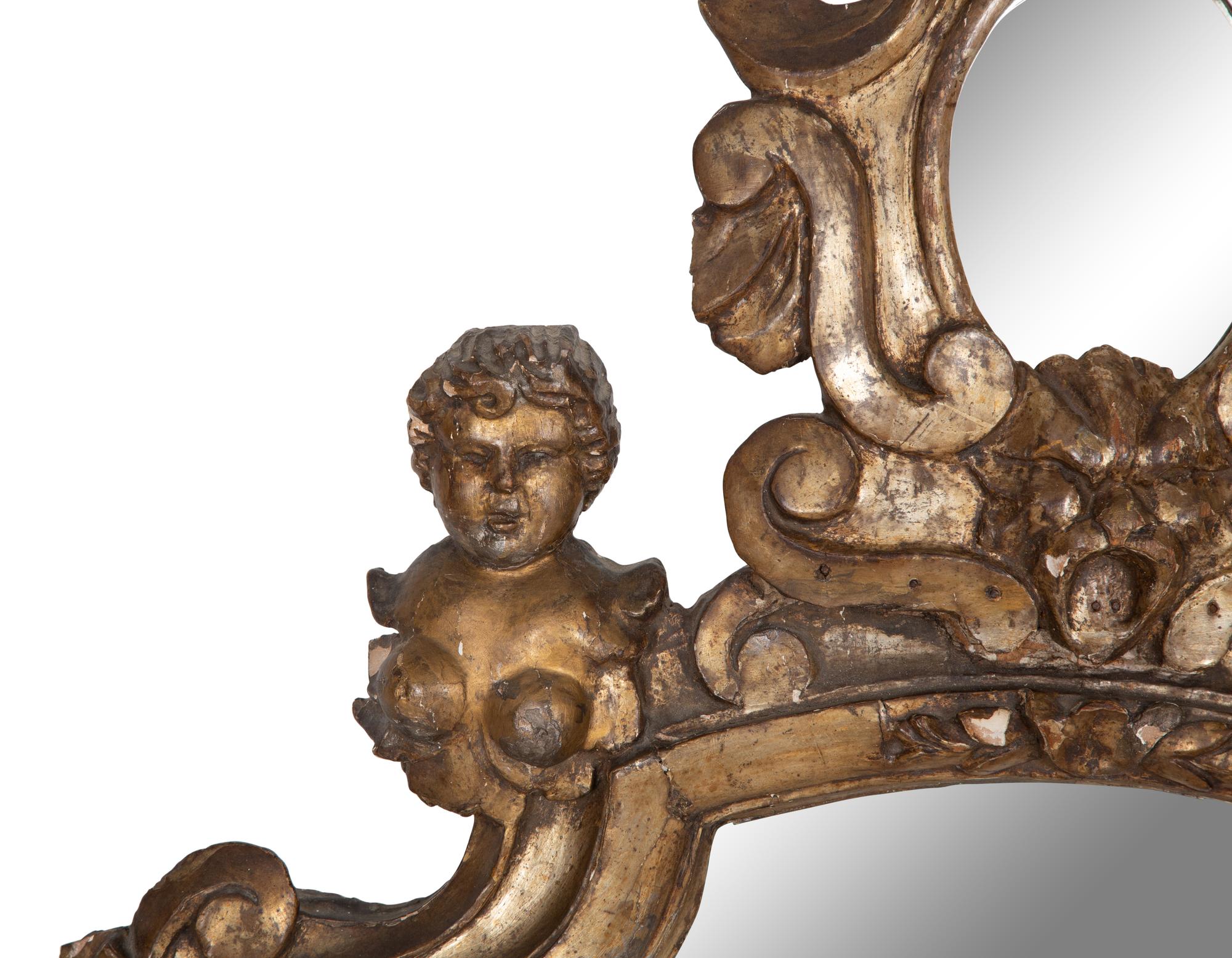 A Venetian Giltwood Mirror