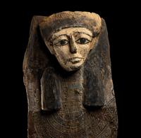 An Egyptian Wood Sarcophagus Cover