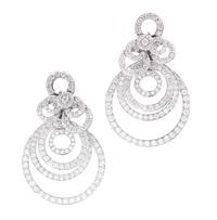 A Pair of 18 Karat White Gold and Diamond Earclips, 22.30 dwts.