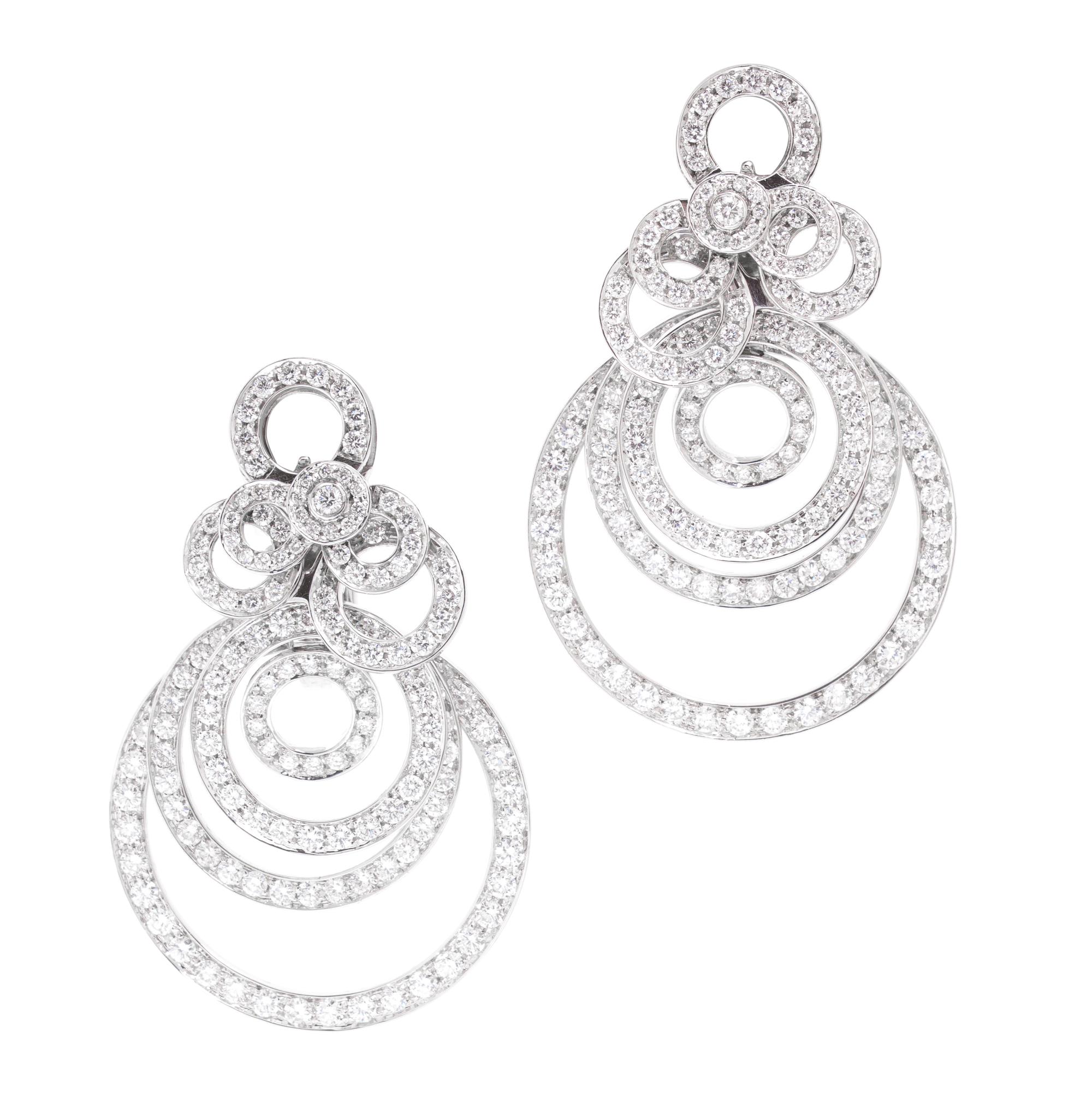 A Pair of 18 Karat White Gold and Diamond Earclips, 22.30 dwts.