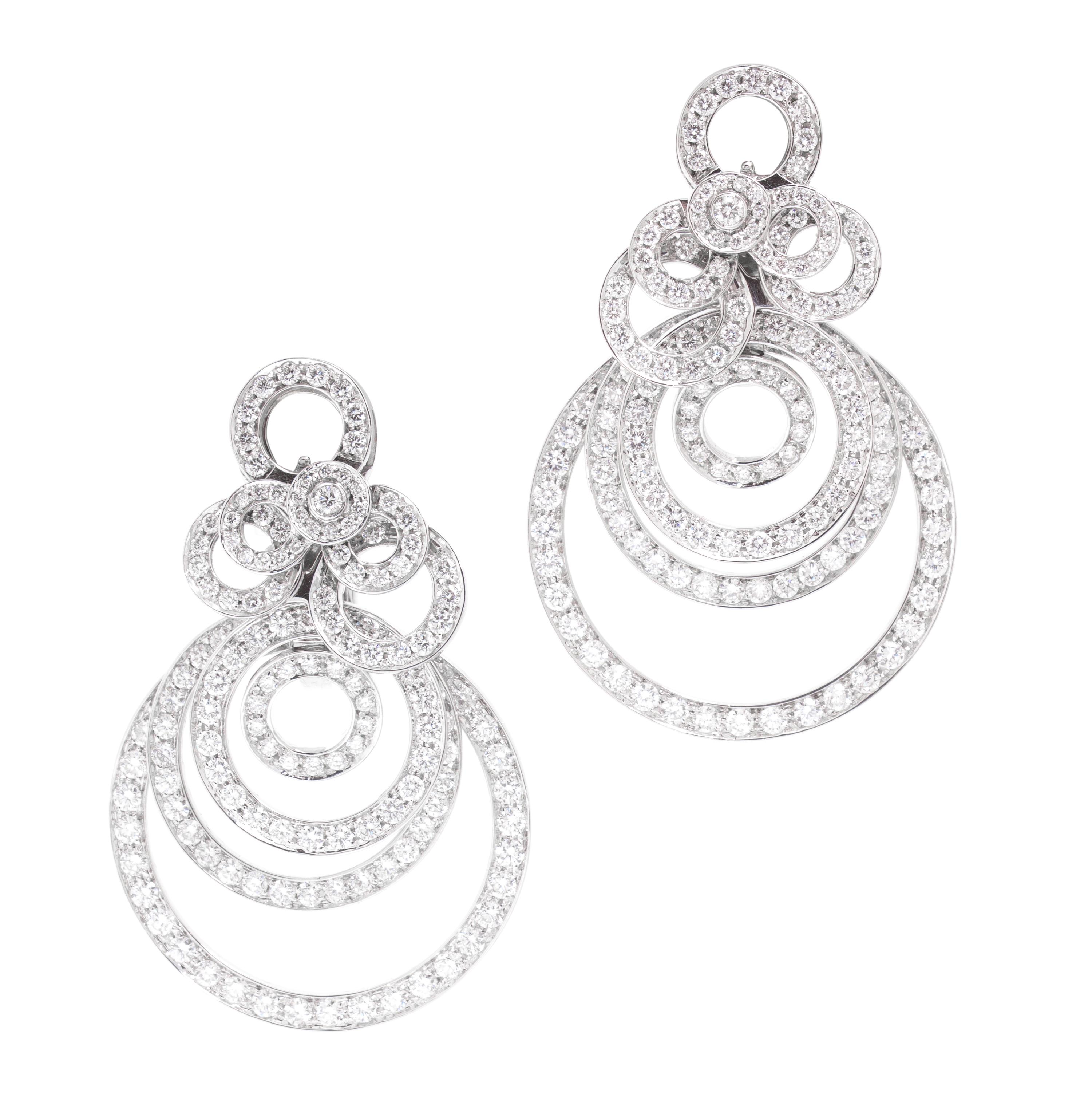 A Pair of 18 Karat White Gold and Diamond Earclips, 22.30 dwts.