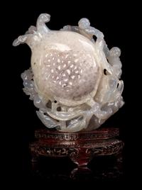 A Chinese Carved 'Boy and Pomegranate' Group