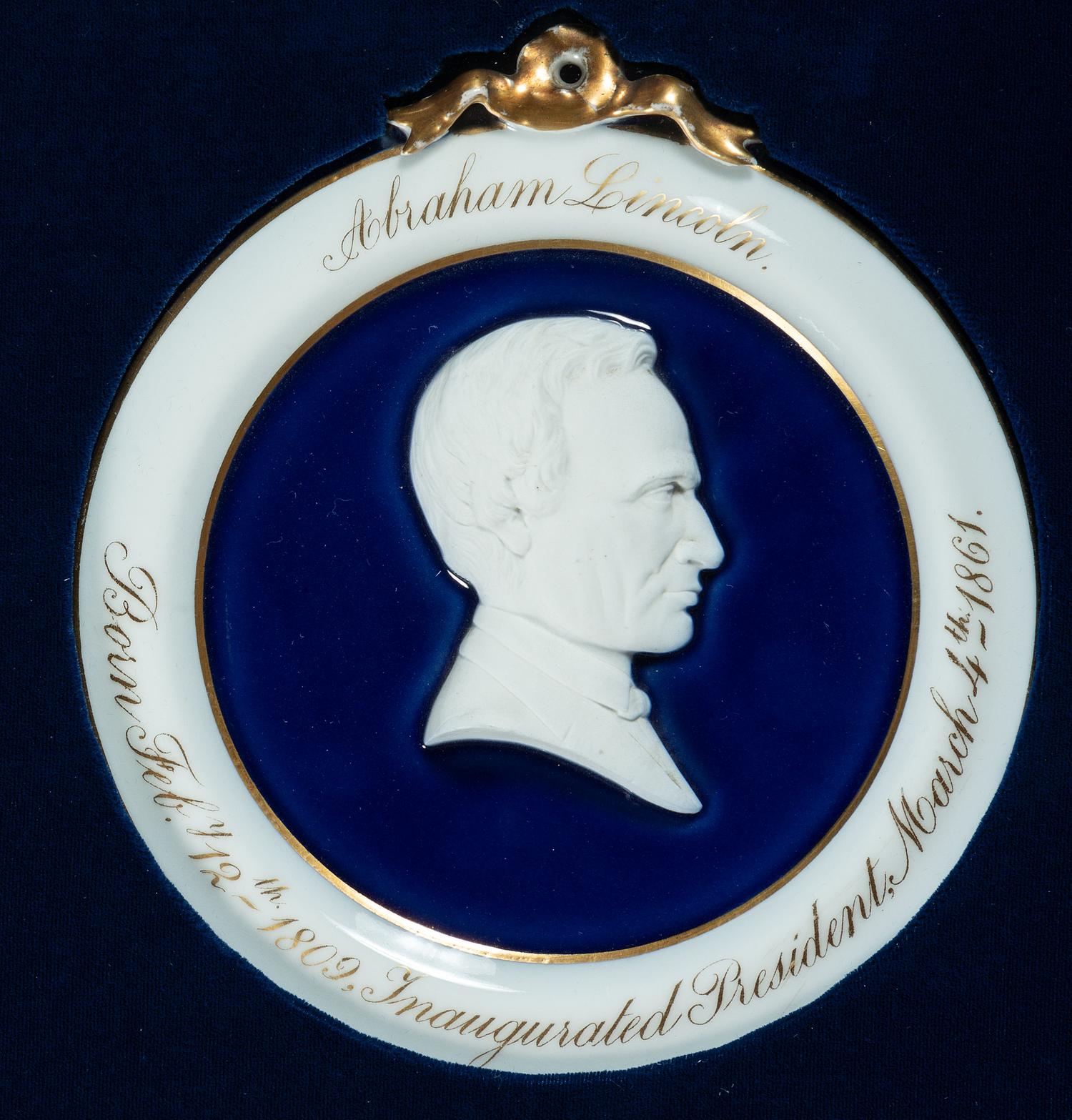 [LINCOLN, Abraham (1809-1865)]. Porcelain bas-relief inaugural wall plaque, ca 1861.