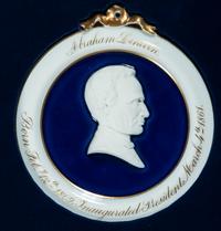[LINCOLN, Abraham (1809-1865)]. Porcelain bas-relief inaugural wall plaque, ca 1861.