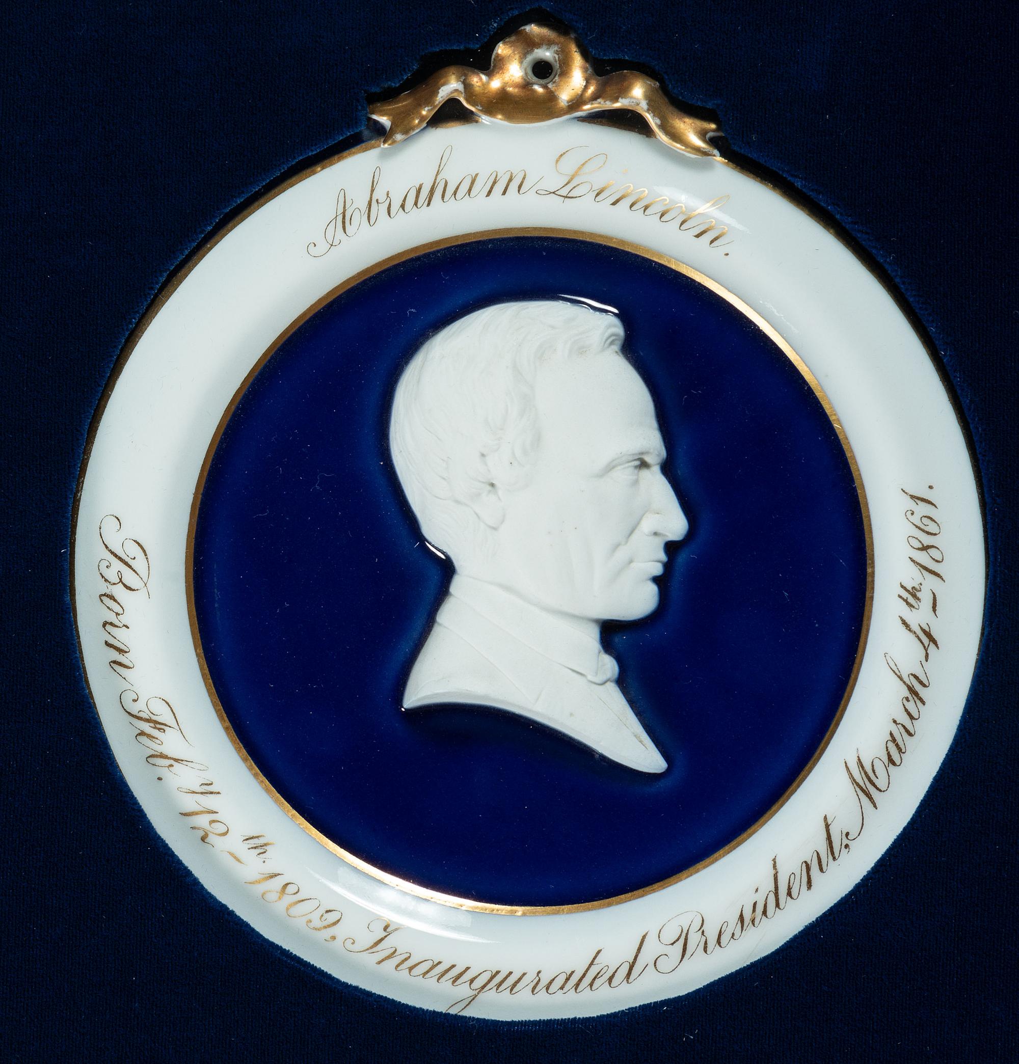 [LINCOLN, Abraham (1809-1865)]. Porcelain bas-relief inaugural wall plaque, ca 1861.
