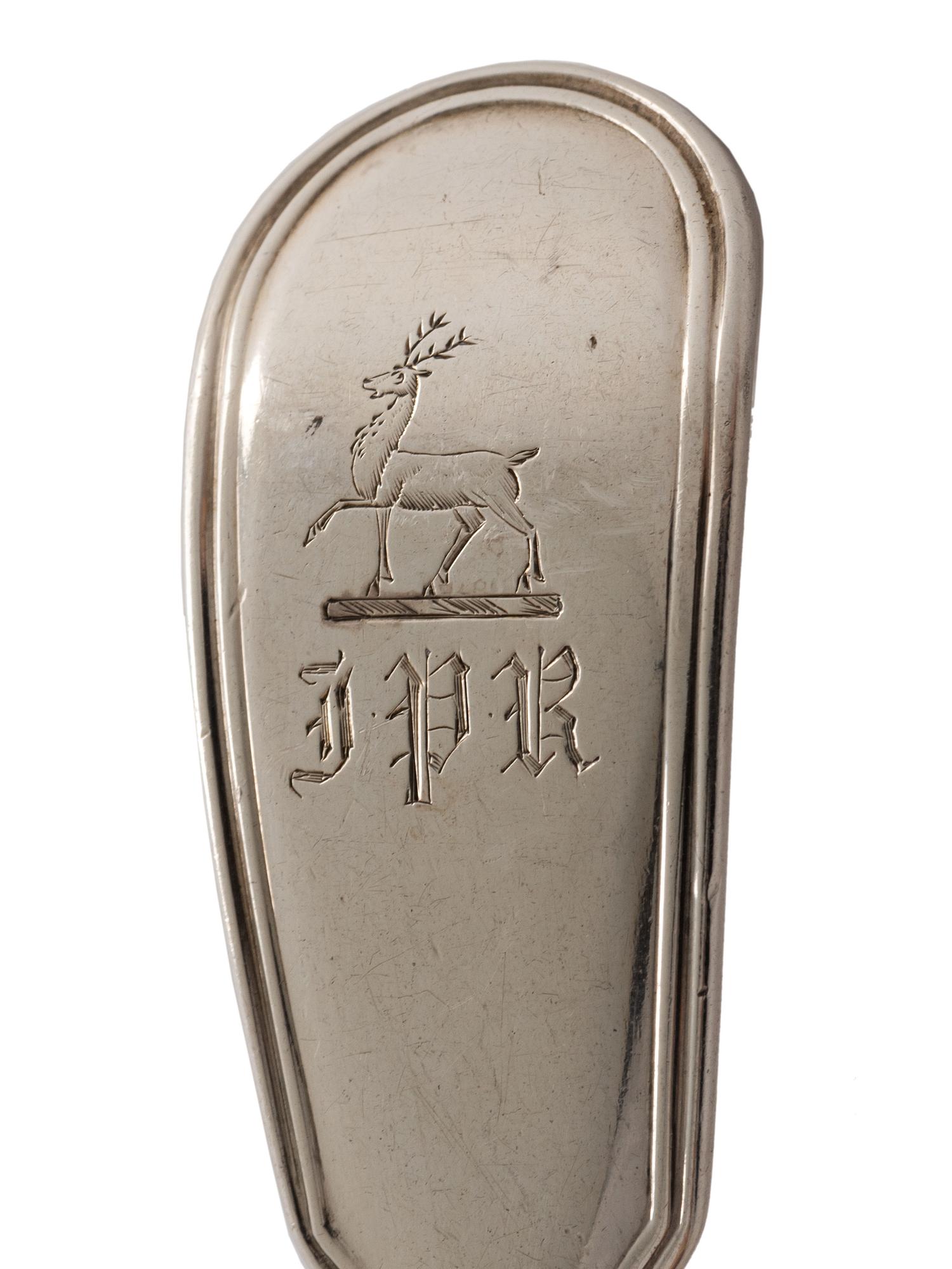 An English Silver Cranberry Spoon, Sauce Ladle and Slotted Ladle