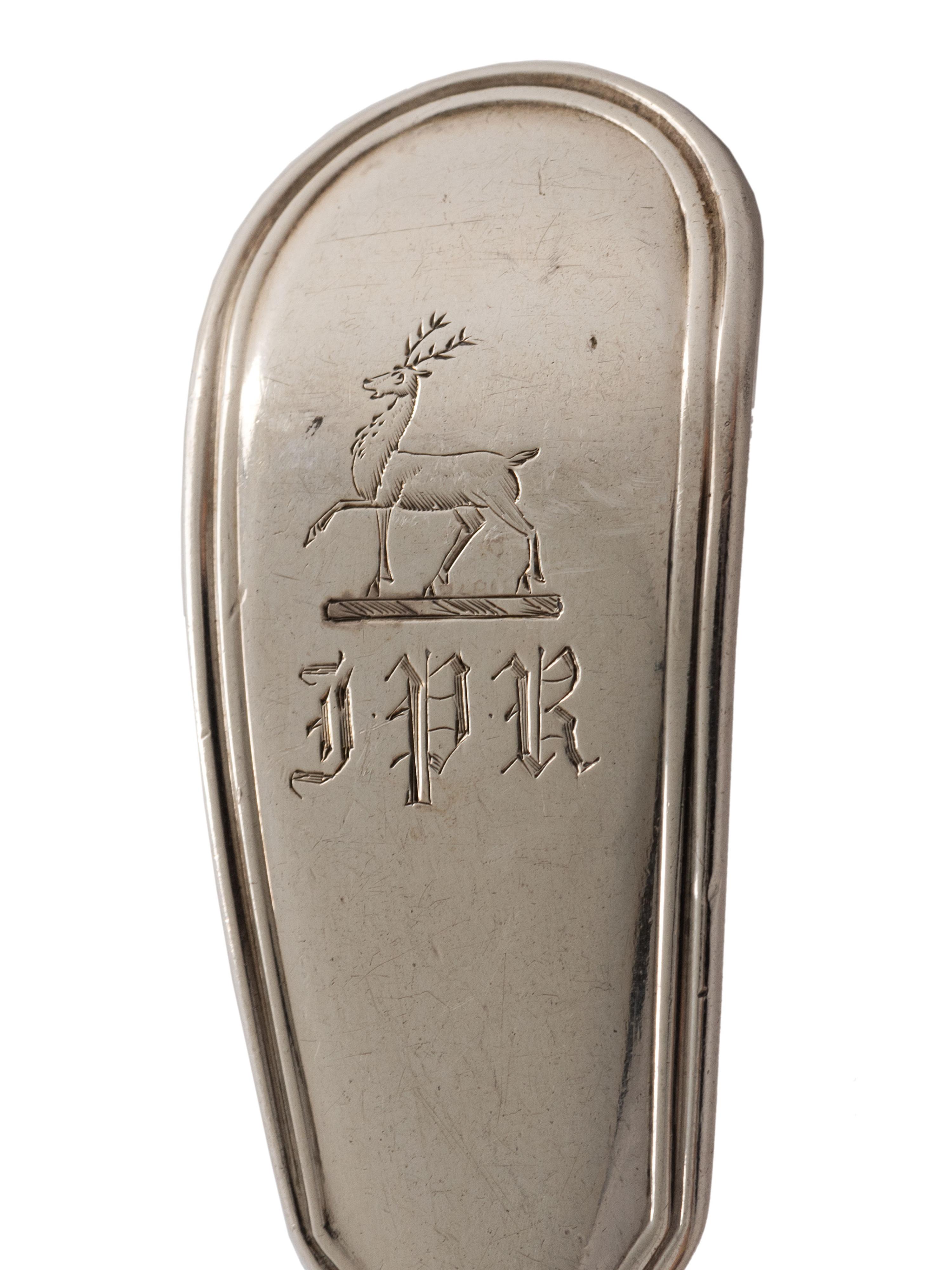 An English Silver Cranberry Spoon, Sauce Ladle and Slotted Ladle