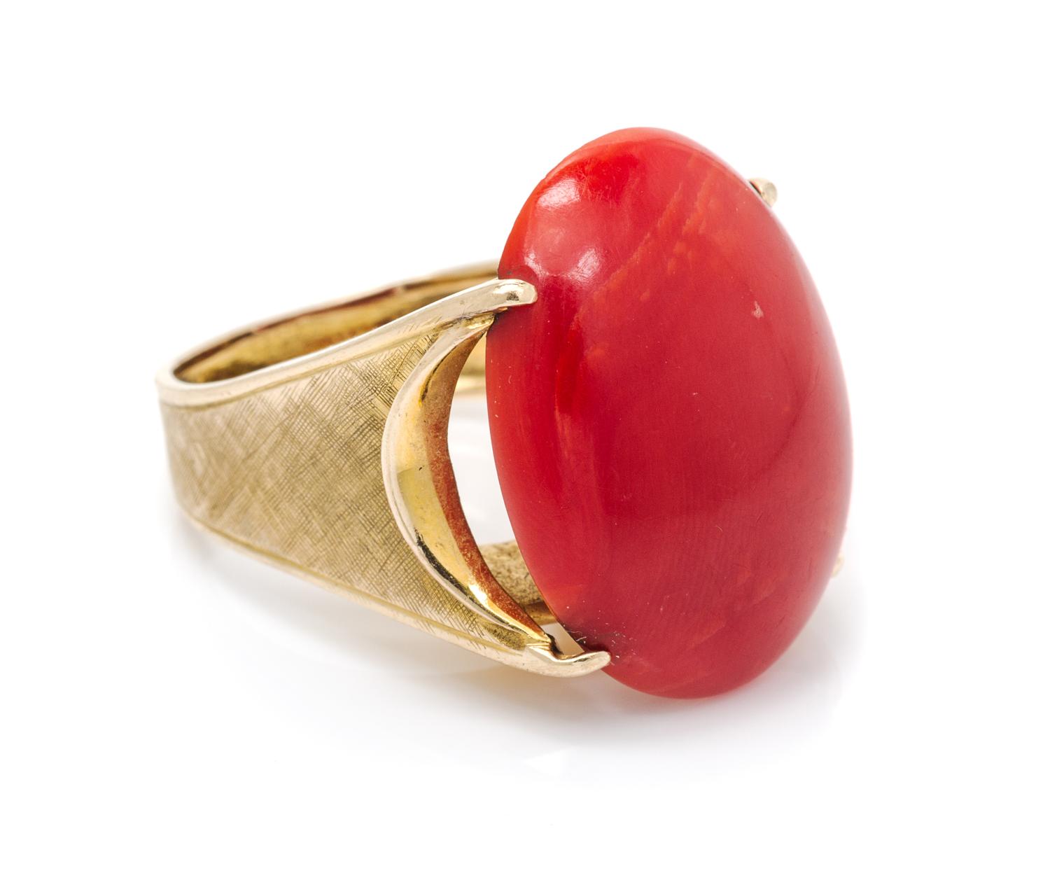 An 18 Karat Yellow Gold and Coral Ring, 8.80 dwts.