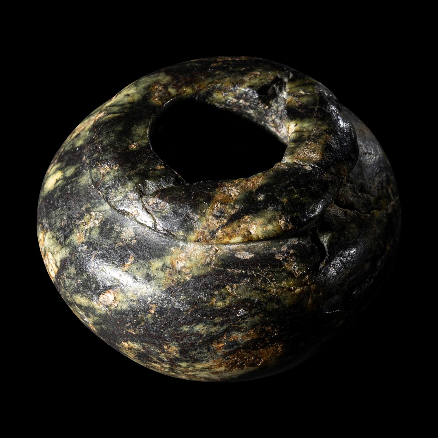 An Egyptian Serpentine Cosmetic Vessel