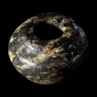 An Egyptian Serpentine Cosmetic Vessel