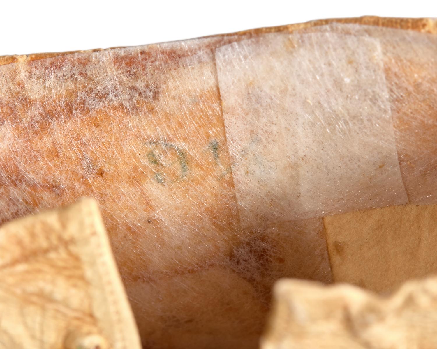 [LINCOLN ASSASSINATION]. A pair of stained leather gloves carried by President Abraham Lincoln at Ford's Theatre on the night of his assassination, 14 April 1865.