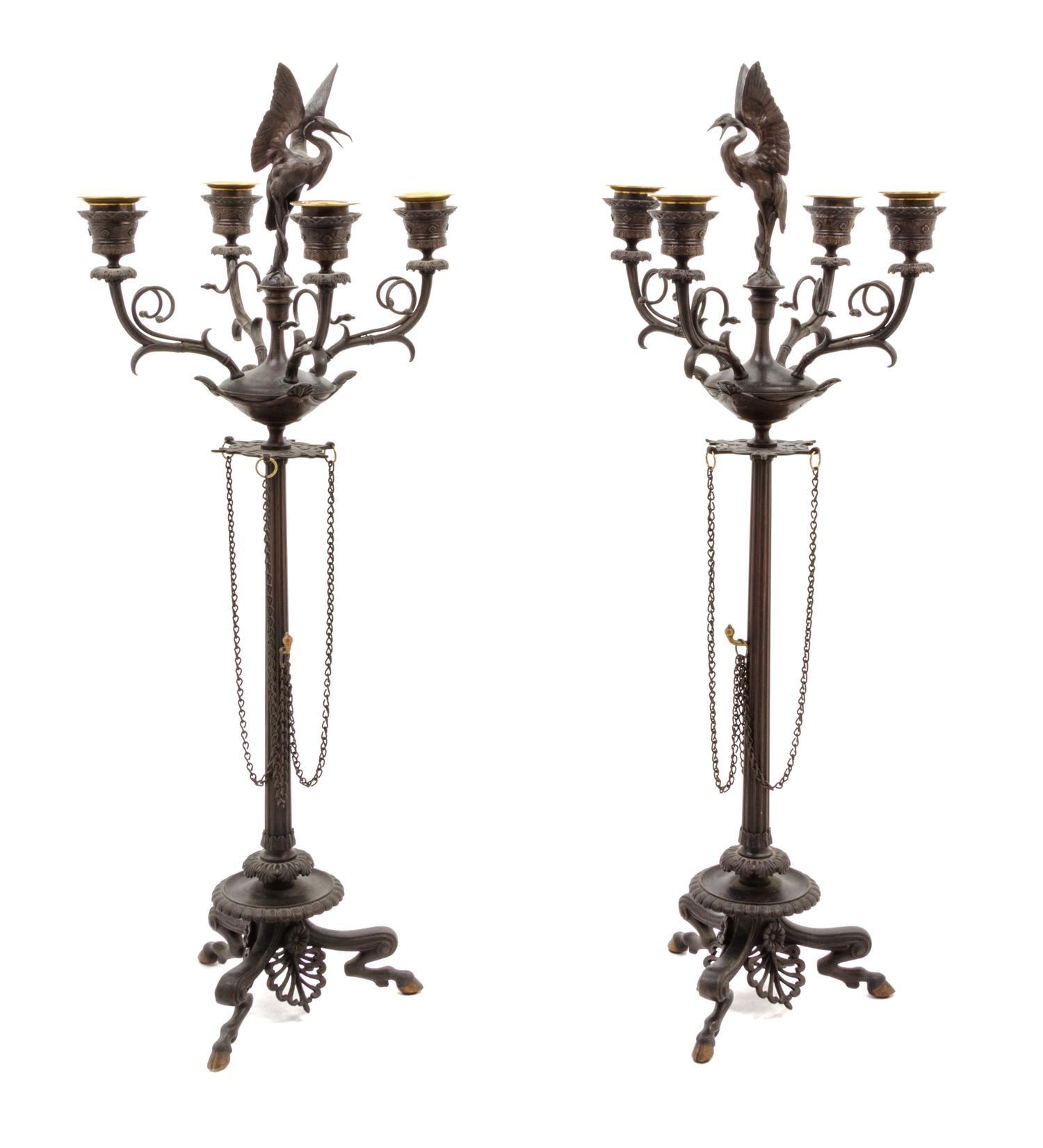 A Pair of Neoclassical Style Cast Metal Four-Light Candelabra Height 24 1/4 inches.