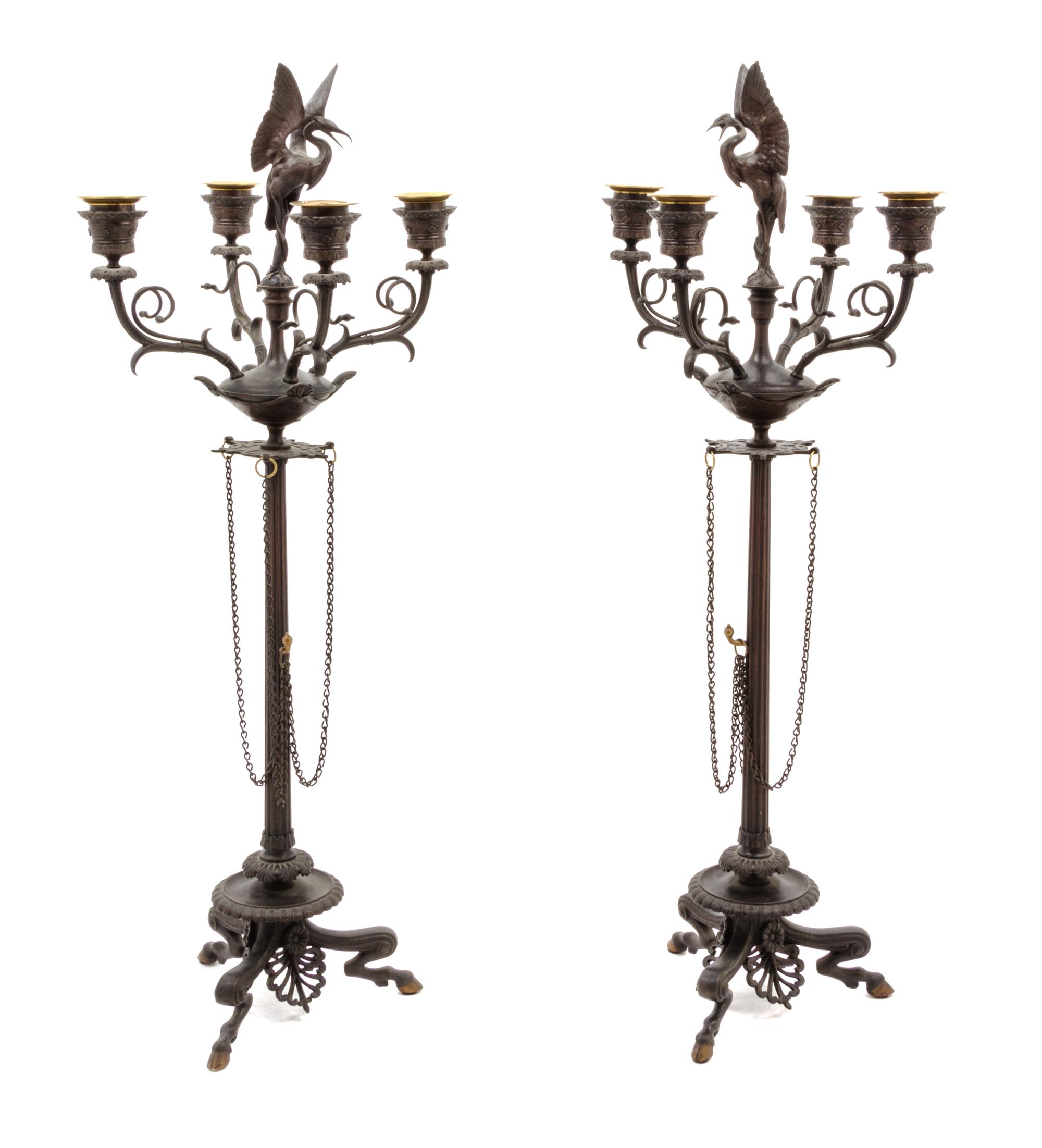 A Pair of Neoclassical Style Cast Metal Four-Light Candelabra Height 24 1/4 inches.
