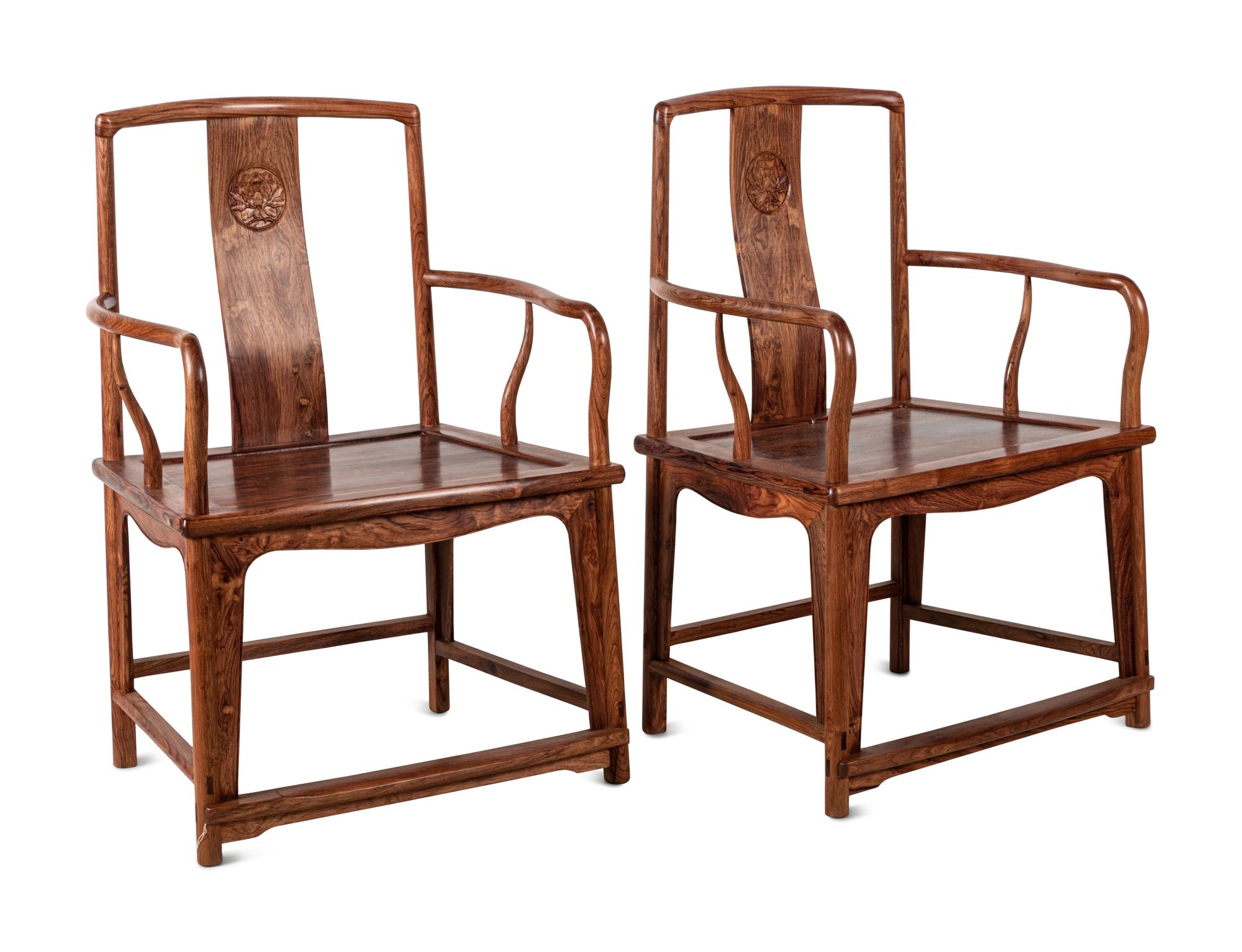 A Set of Chinese Huanghuali Armchairs and Side Table, Nanguanmaoyi