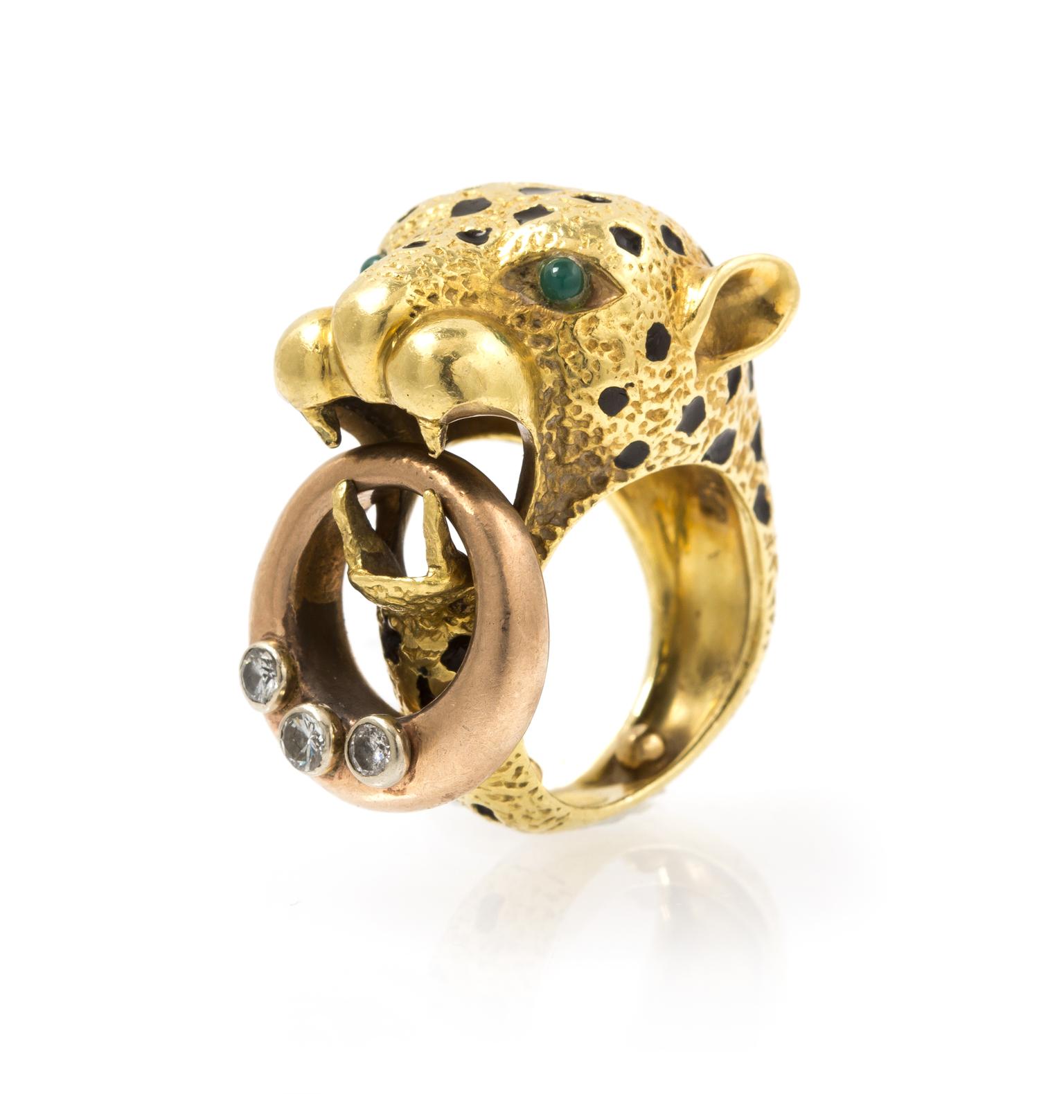 An 18 Karat Gold, Diamond, Enamel and Chalcedony Ring, 13.40 dwts.