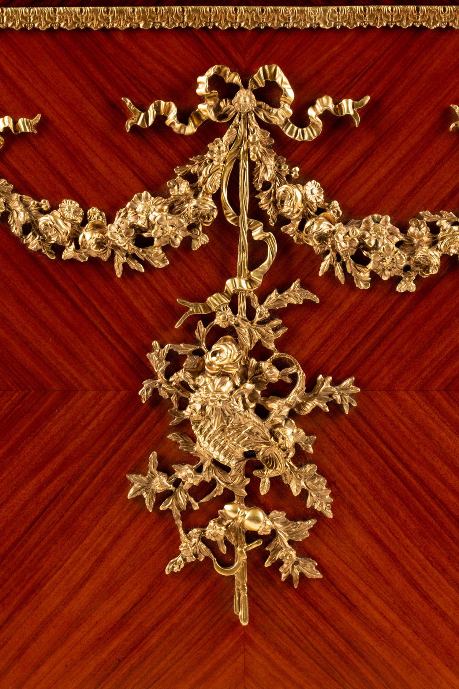 A Louis XVI Style Gilt Bronze Mounted Kingwood and Rosewood Cabinet
