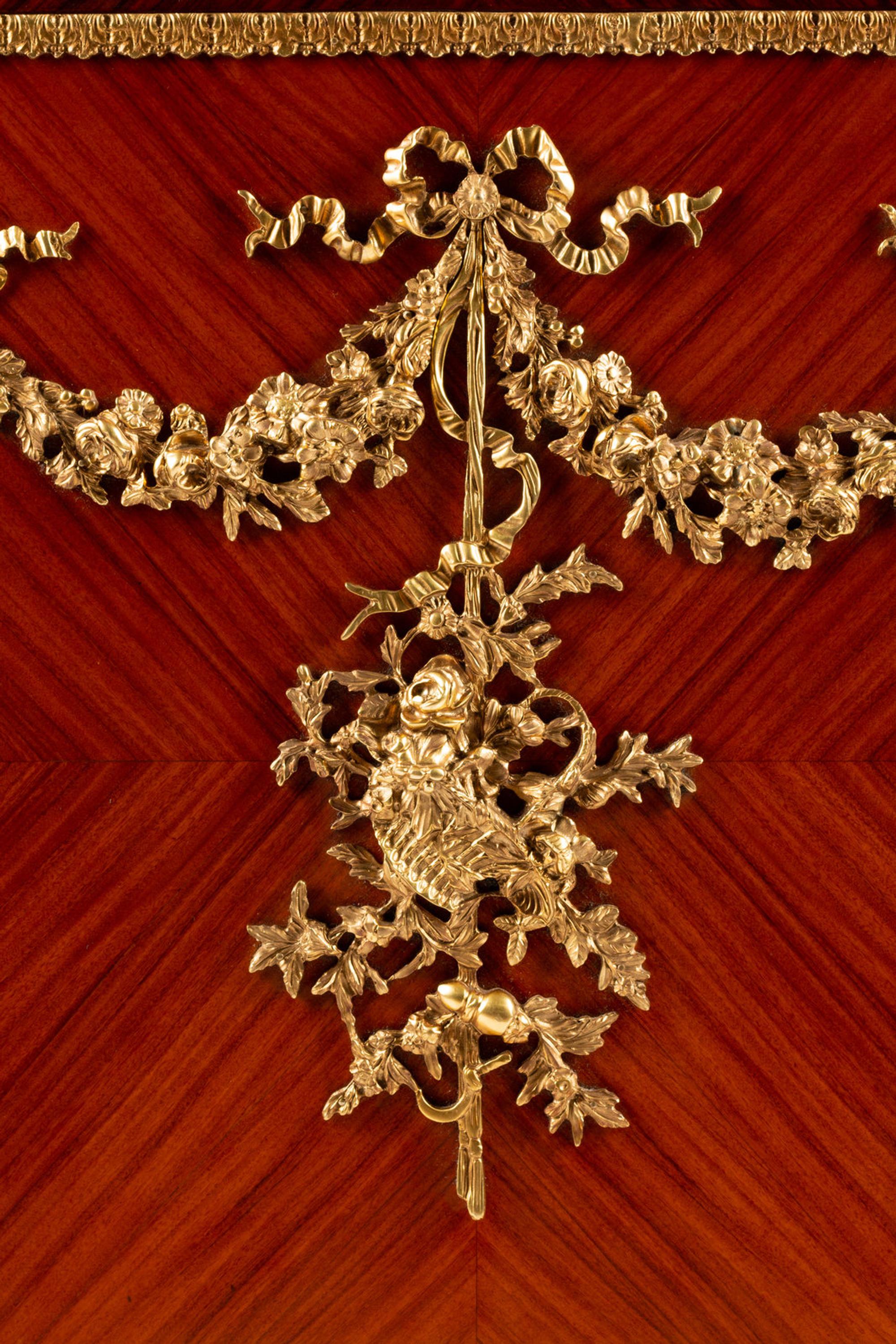 A Louis XVI Style Gilt Bronze Mounted Kingwood and Rosewood Cabinet