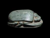 An Egyptian Faience Scarab with a Greek Inscription