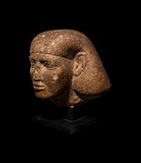 An Egyptian Granite Head of a Scribe