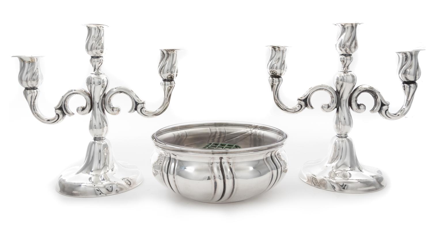 A German Silver Three-Piece Table Garniture, First Half 20th Century, comprising a centerpiece bowl with a glass liner and a pair of we