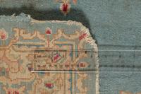 A Kirman Wool Rug