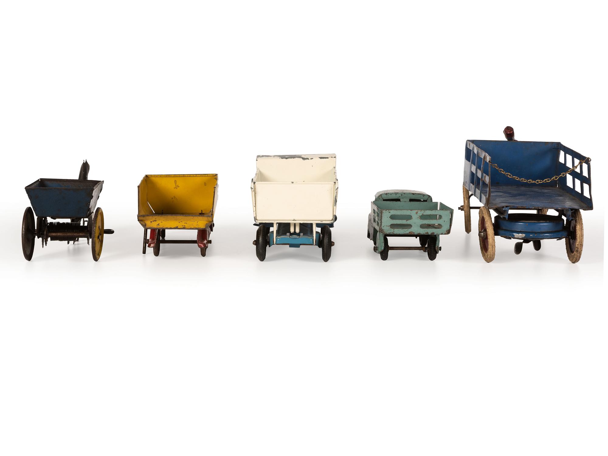 Ten Tin and Pressed Steel Toy Trucks and Wagons