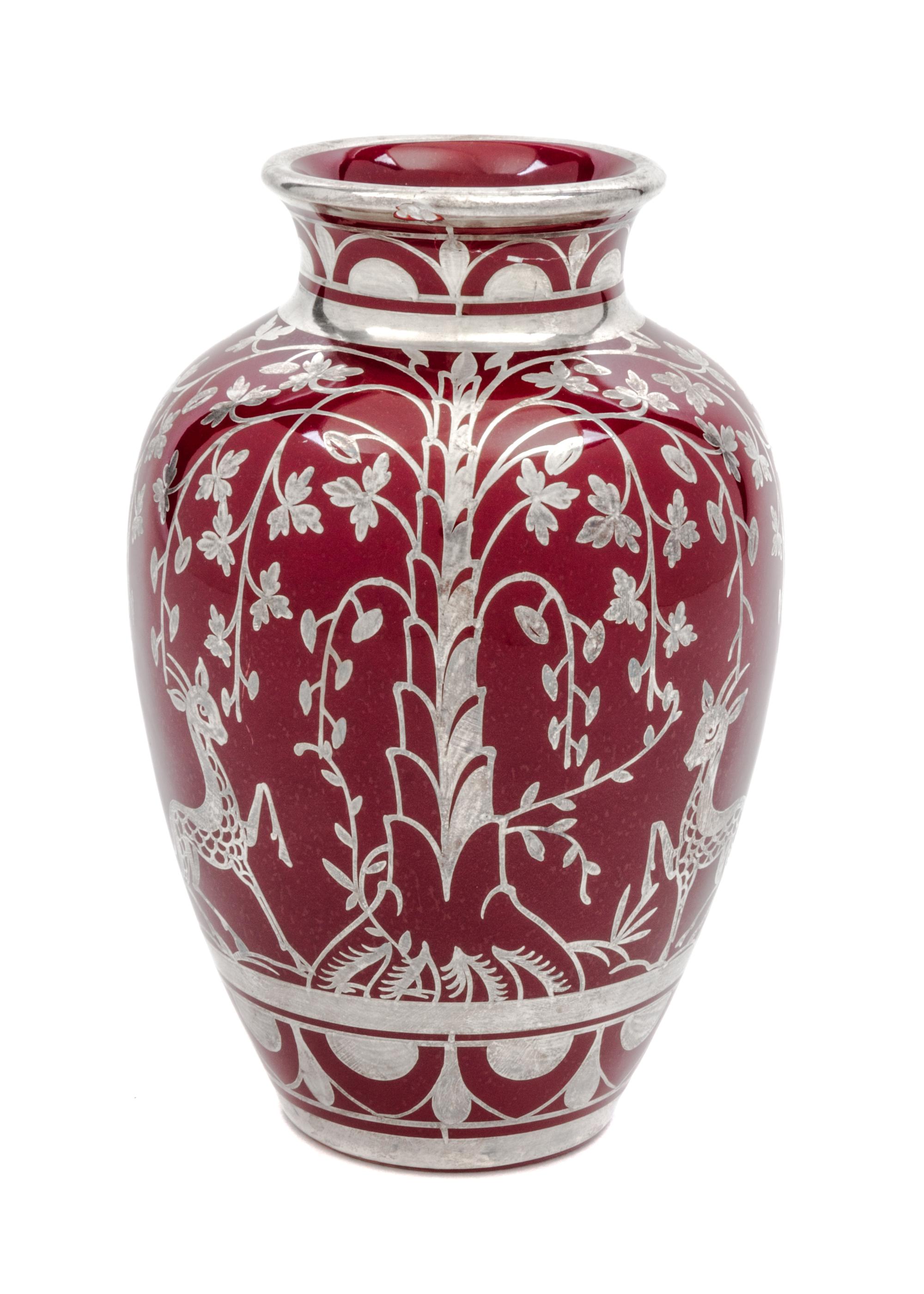 A Ceramic Silver Overlay Vase Height 6 1/4 inches.