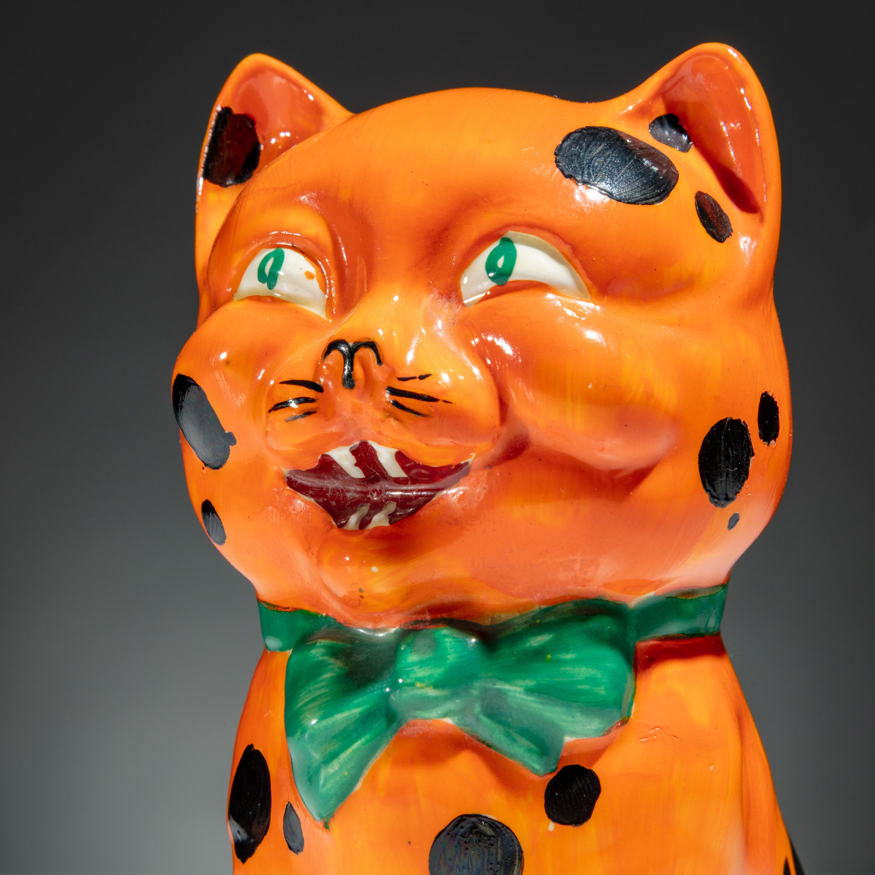 Clarice Cliff (English, 1899–1972) — Two Orange Laughing Cat Figures