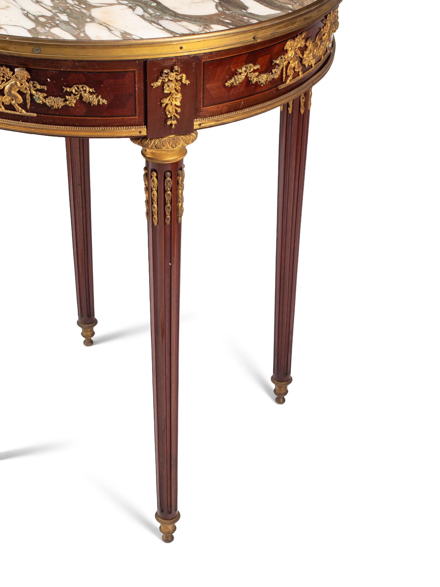 A Louis XVI Style Gilt Bronze Mounted Marble-Top Guéridon
